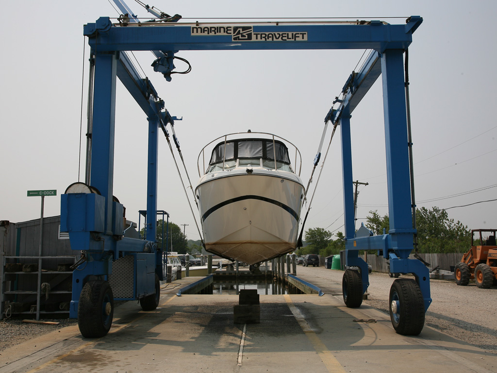 Power boat in outdoor dry storage for the winter at Green Cove Marina in Brick, New Jersey.